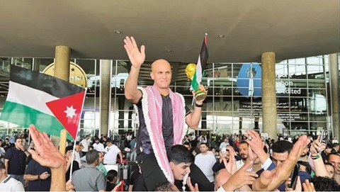A Hero's Welcome for Makhadmeh and His Colleagues After Appearing in the World Cup Final