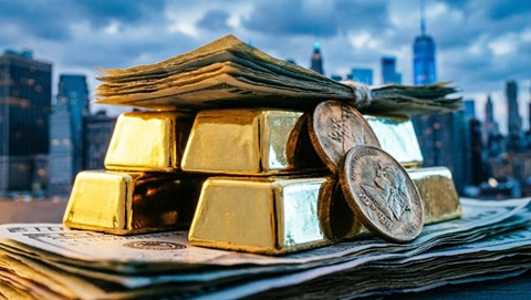 Gold Plummets as Dollar Rises Ahead of Federal Reserve Decision